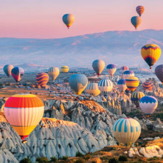 Hot air balloons floating over Cappadocia, Turkey, inspire self-flying pilots with their own aircraft to explore the breathtaking landscapes and cultural wonders of Eurasia, offering a unique perspective on a journey through ancient history and natural beauty.