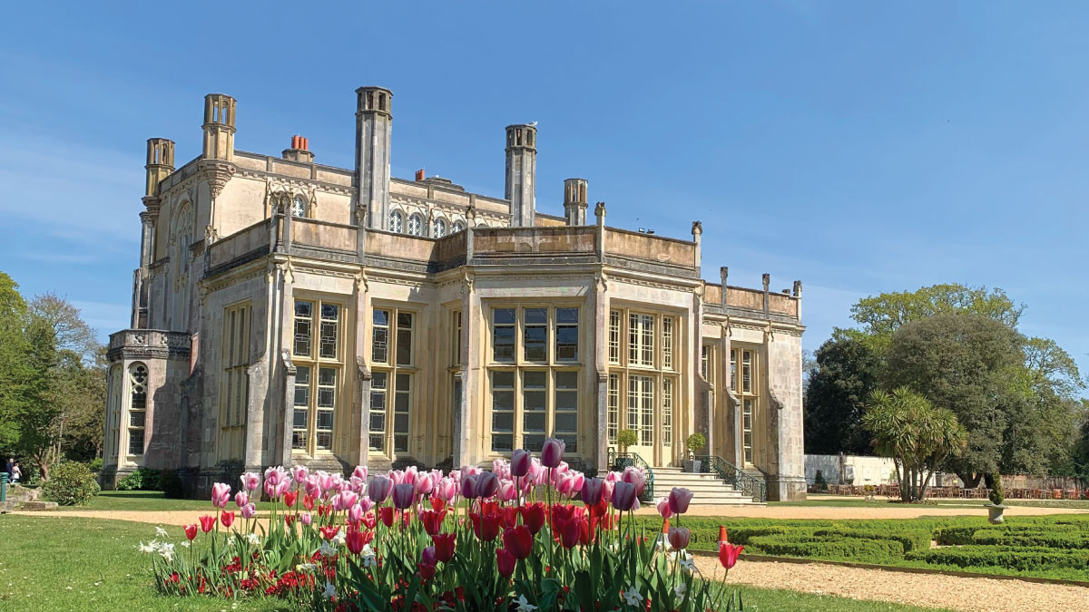 Highcliffe Castle in Bournemouth, England, alluring self-flying pilots with their own aircraft to indulge in Europe's historical grandeur and architectural marvels, amidst the lush greenery of the English countryside.
