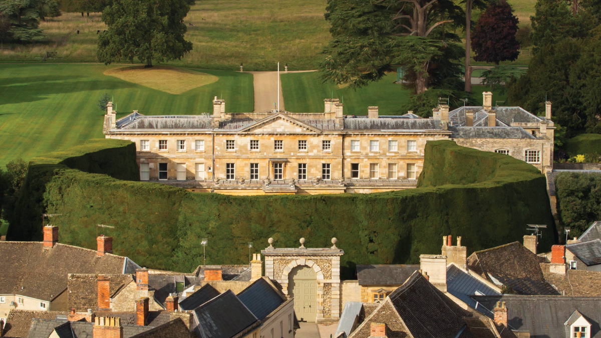 Cirencester Park in Cirencester, England, enticing self-flying pilots with their own aircraft to embark on a majestic journey through Eurasia's scenic wonders, where verdant landscapes and historic estates await exploration from above.