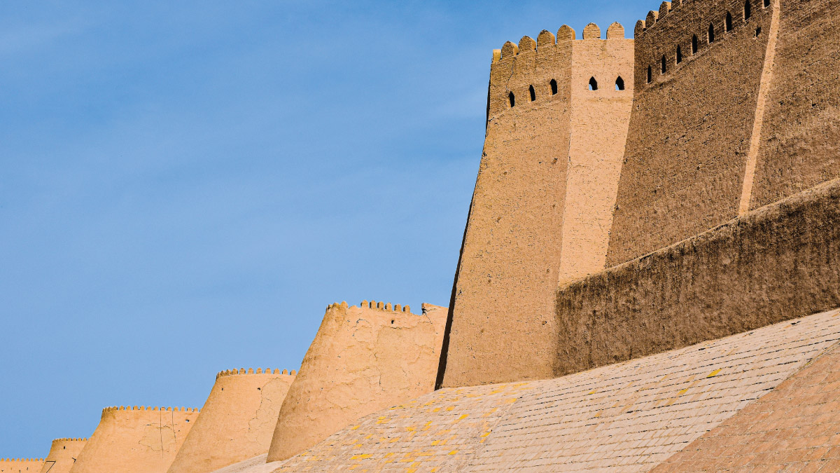 Watchtower over the Khuna Ark in Khiva, Uzbekistan, beckoning self-flying pilots with their own aircraft to embark on a journey through Eurasia's timeless landscapes and historical treasures, offering a glimpse into the region's rich heritage from above.