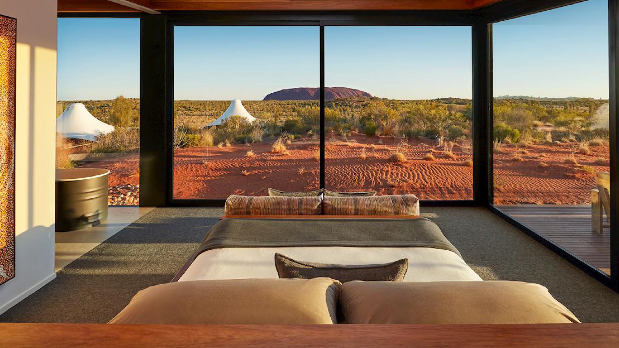 Capture the majestic beauty of Uluru in Australia, a highlight of the journey spanning 21 countries, tailored for self-flying pilots. Experience the spiritual enormity of this iconic landmark, revered by indigenous communities, amidst the breathtaking landscape of Australia's heartland.