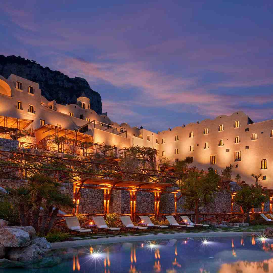 Monastero Santa Rosa pool on the Amalfi Coast in Salerno, Italy, alluring self-flying pilots with their own aircraft to indulge in European luxury and relaxation amidst breathtaking coastal scenery.