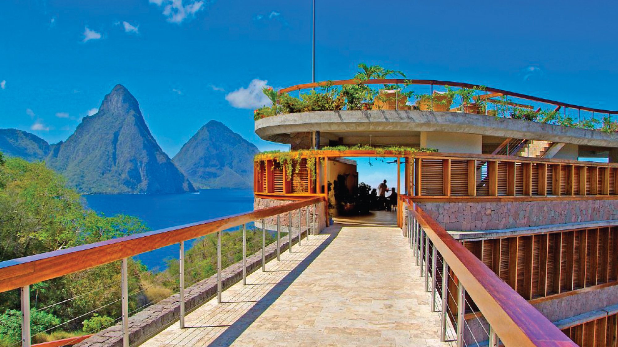 A breathtaking view of Jade Mountain Hotel in Castries, St. Lucia, showcasing its stunning architecture and panoramic vistas of the Caribbean Sea. Tailored for self-flying pilots