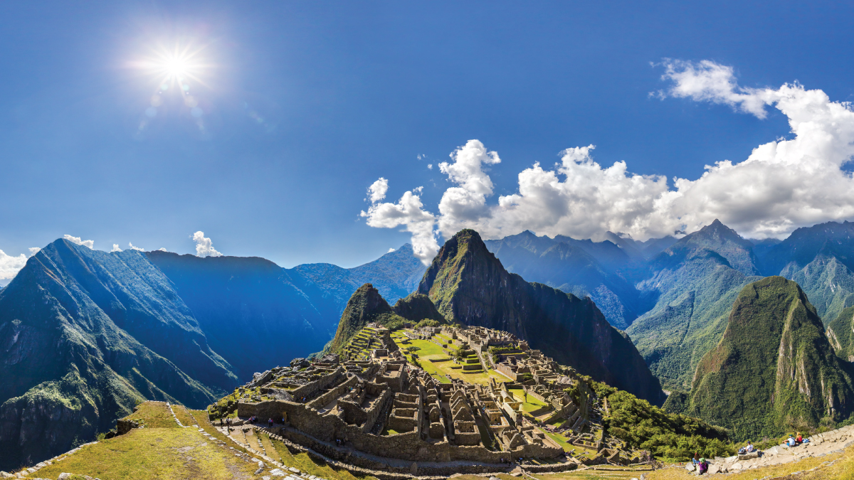A breathtaking aerial vista of Machu Picchu, Peru, revealing the ancient citadel nestled amidst the rugged Andean mountains. A captivating destination for self-flying pilots exploring South America, Machu Picchu offers a glimpse into the rich history and majestic beauty of Peru, beckoning adventurers to discover its mystical allure from above.