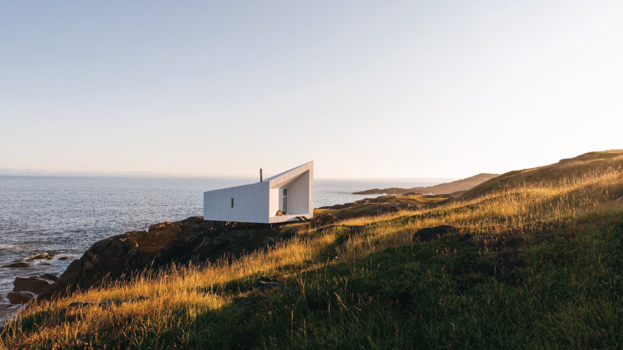 A captivating view of Fogo Island, highlighting its rugged coastline, picturesque villages, and stunning natural landscapes. Tailored for self-flying pilots