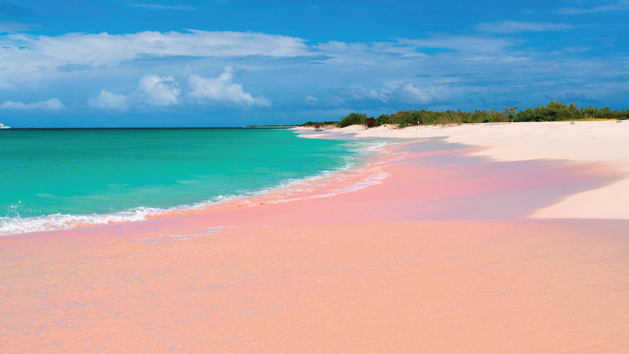 A stunning pink sand beach on Harbour Island, Bahamas, beckoning self-flying pilots to discover this picturesque destination