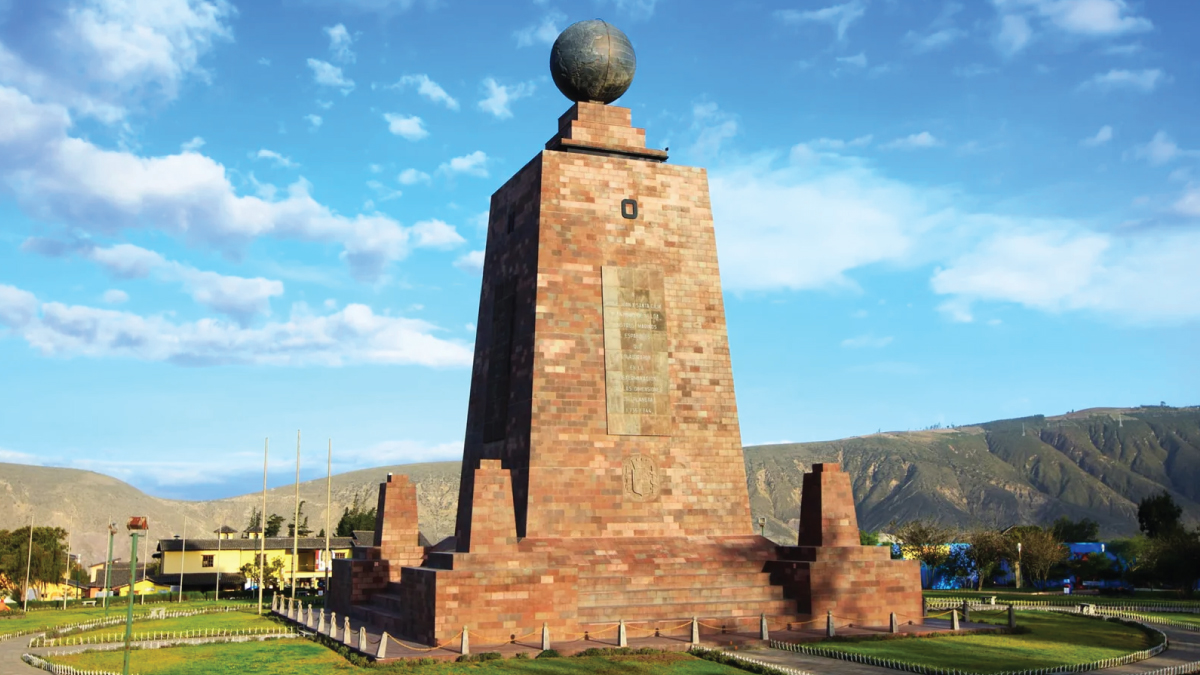 An iconic view of the Mitad del Mundo Monument in Quito, Ecuador, marking the equatorial line with precision. A captivating landmark for self-flying pilots exploring South America, offering a unique aerial perspective of Ecuador's geographical significance and cultural heritage amidst the skies of Quito.