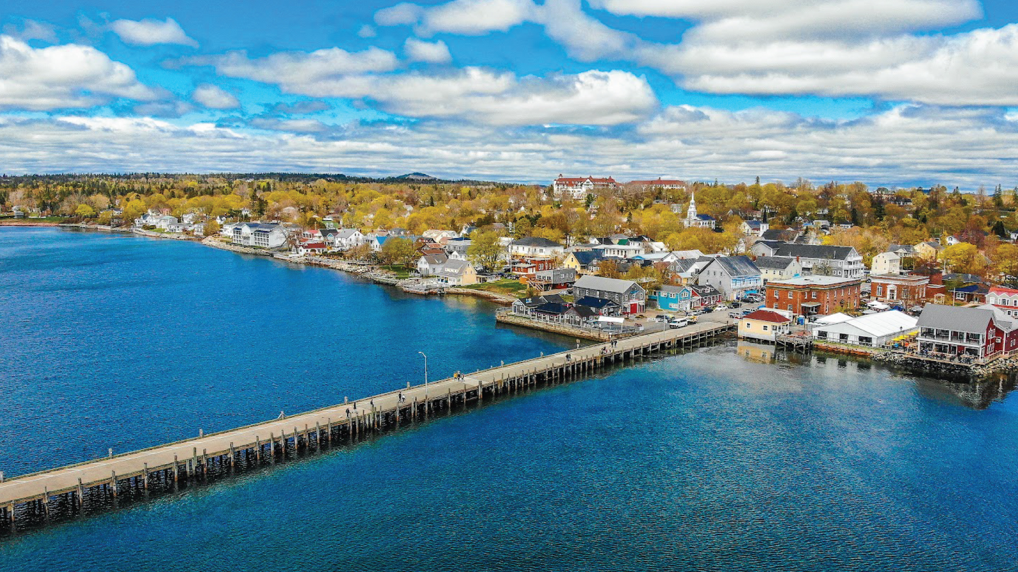 A captivating view of St. Andrews by the Sea in the Canadian Maritimes, showcasing its charming coastal scenery and historic architecture. Tailored for self-flying pilots.