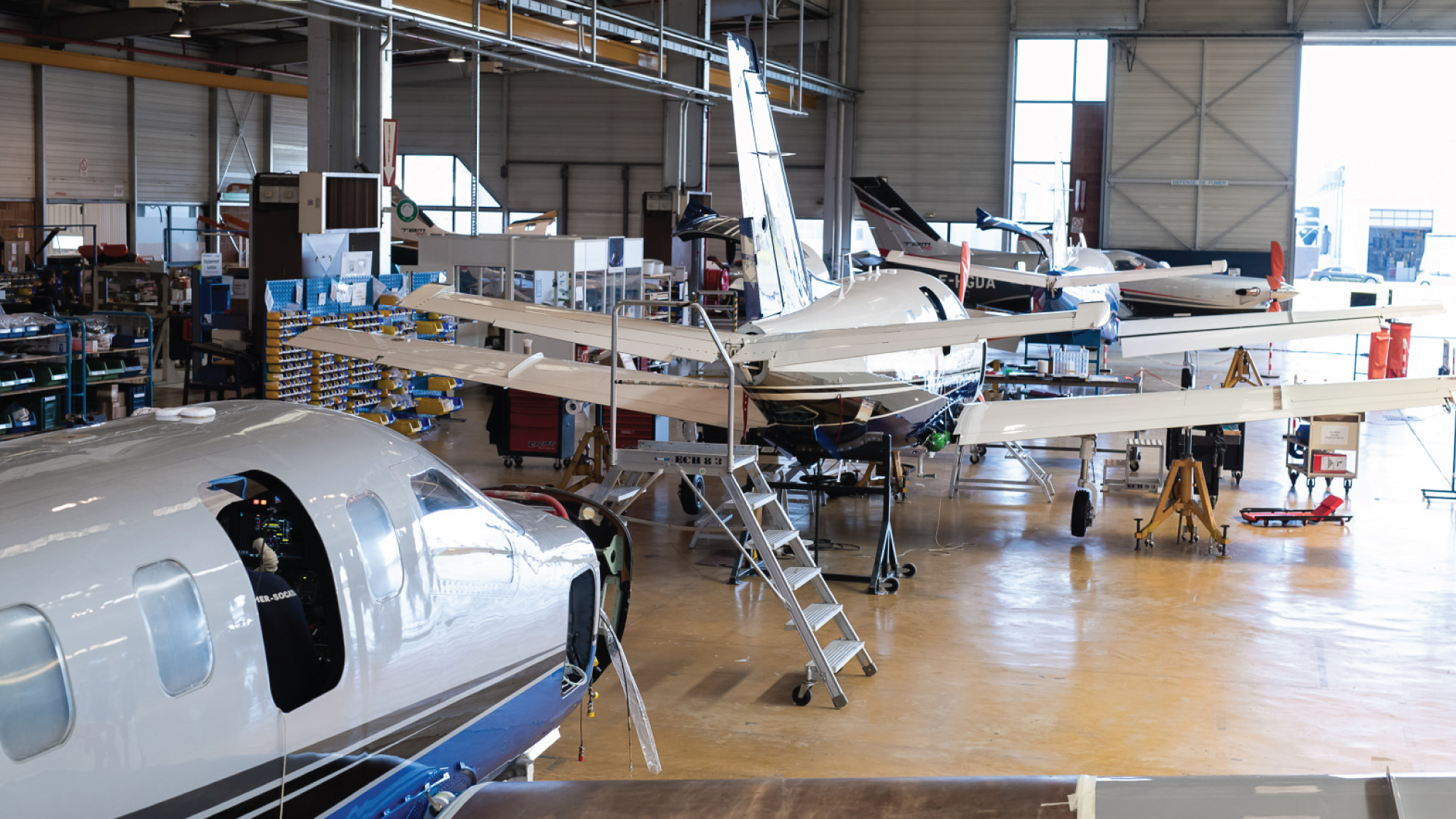 A view of the Daher factory complex in Tarbes, France, where aircraft manufacturing takes place. Tailored for self-flying pilots planning an european adventure