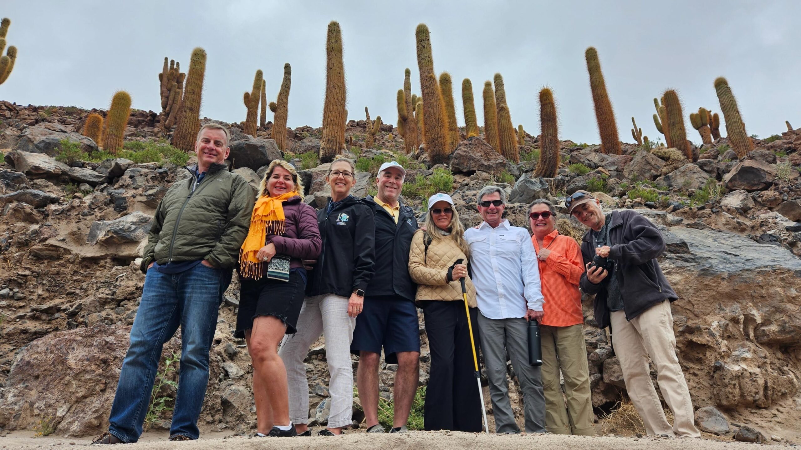 A group of travelers is trekking through the Atacama Desert in Chile.