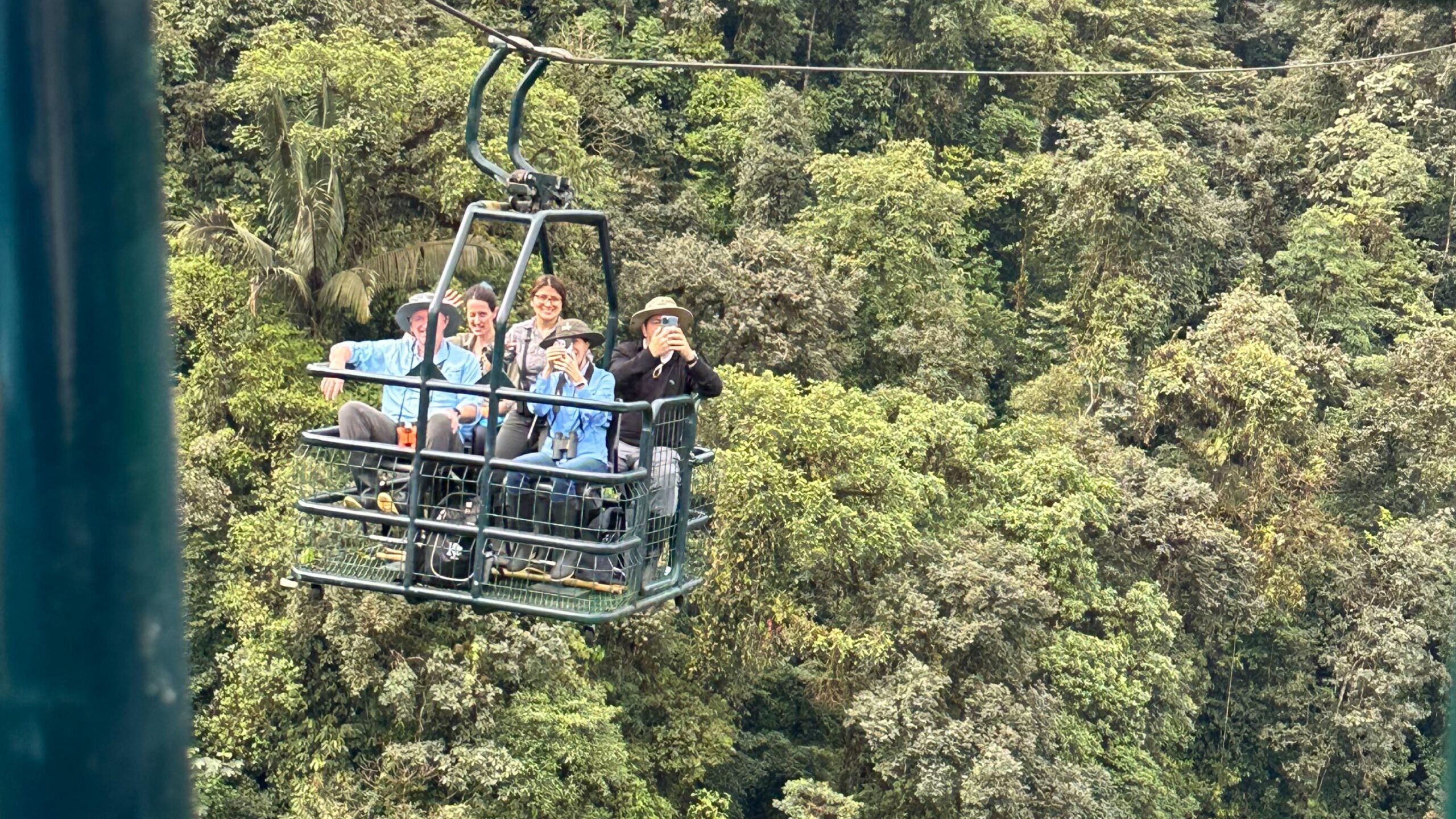 An adventurous canopy cart ride through the lush Mashpi Lodge Private Reserve in Ecuador,