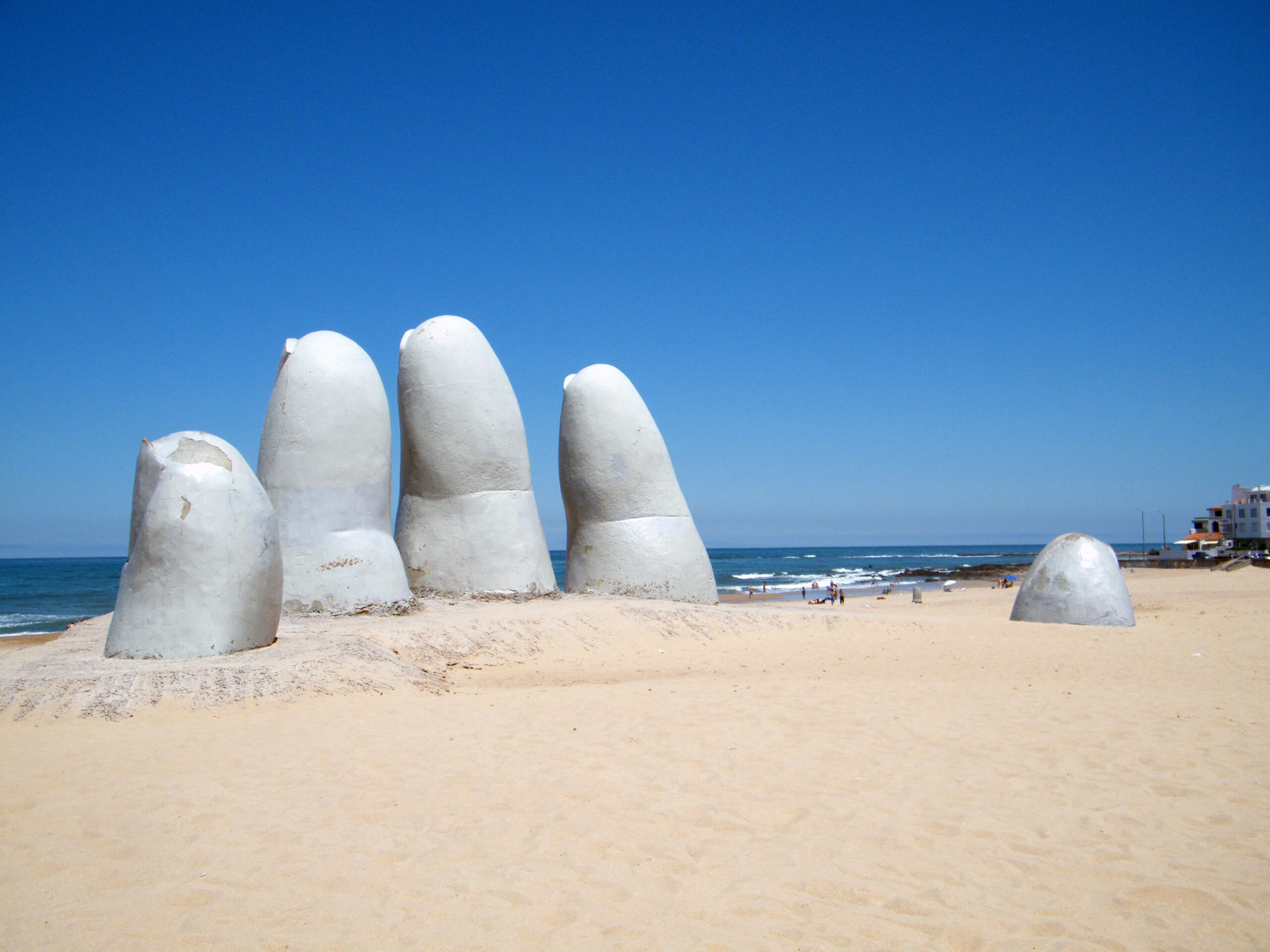 Captivating photo of The Hand of Punta del Este sculpture in Punta del Este, Uruguay