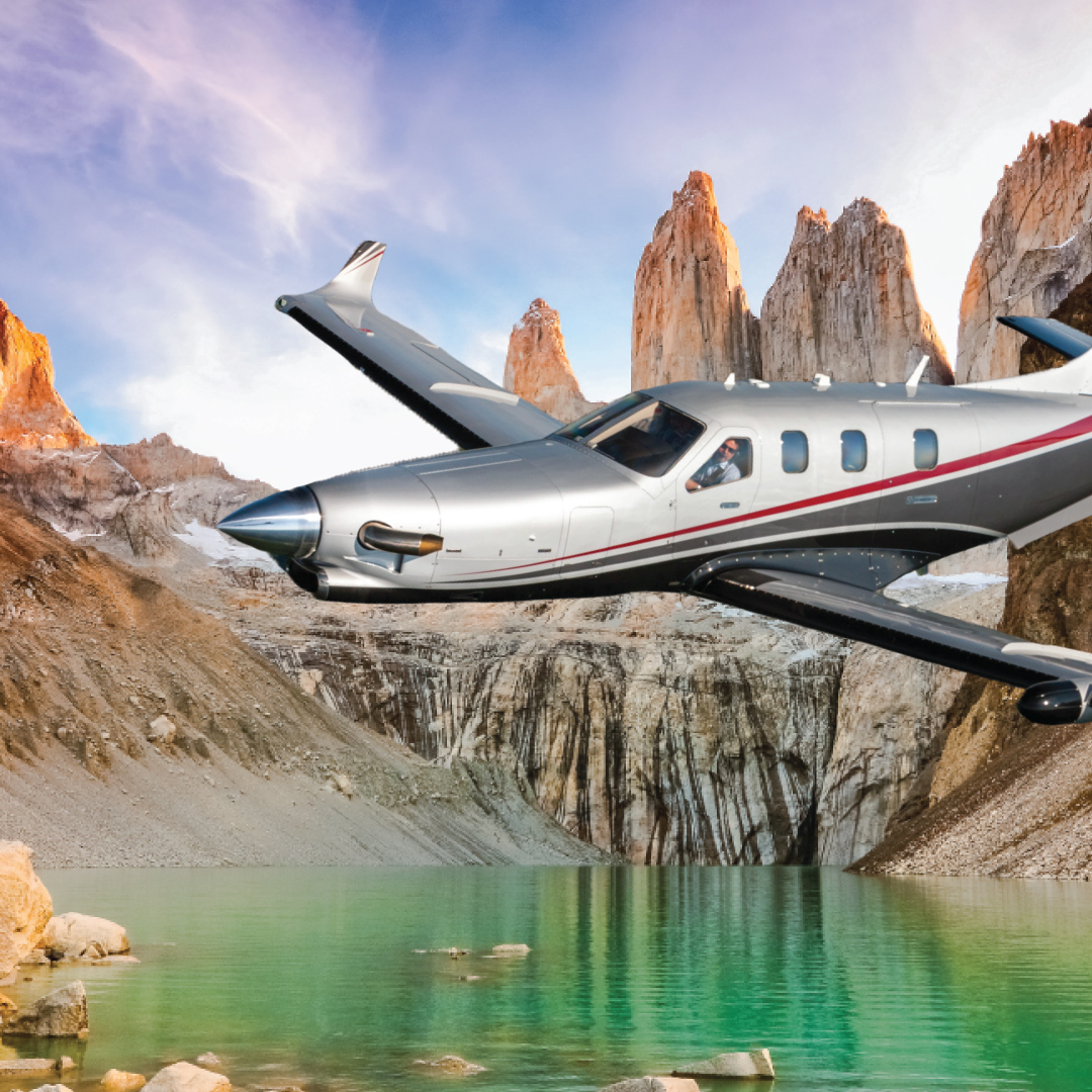 A stunning aerial view of Chilean Patagonia, showcasing rugged mountain peaks, vast glaciers, and pristine lakes. A dream destination for self-flying pilots exploring South America