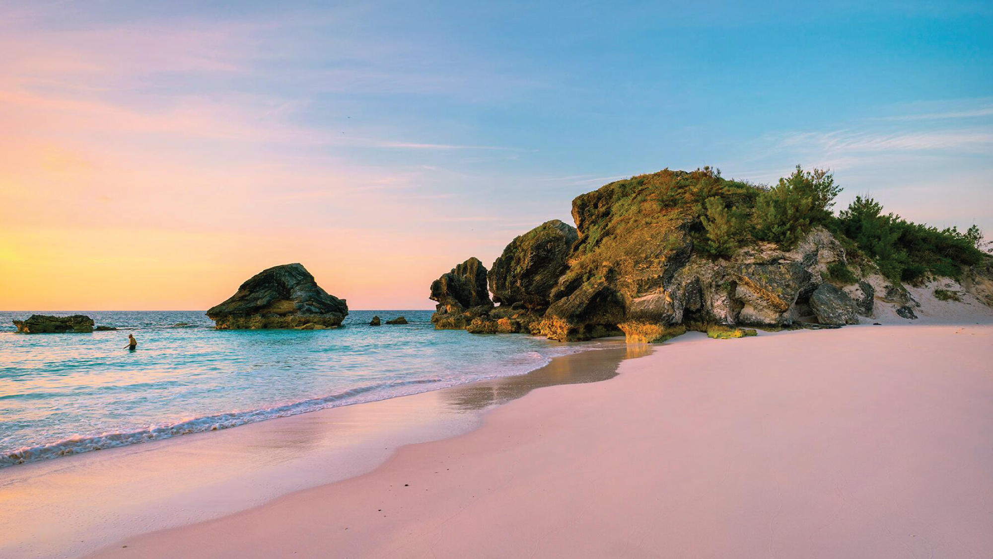 Crystal-clear waters and pink sand beaches.