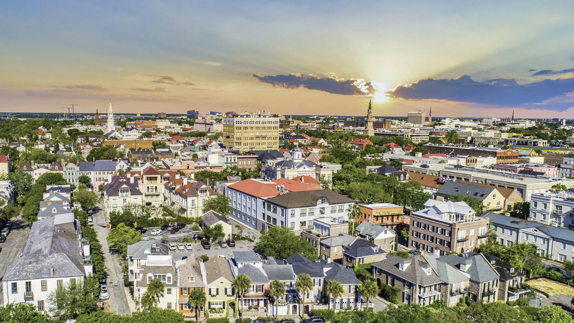 Aerial view of Charleston's historic downtown with scenic waterways.