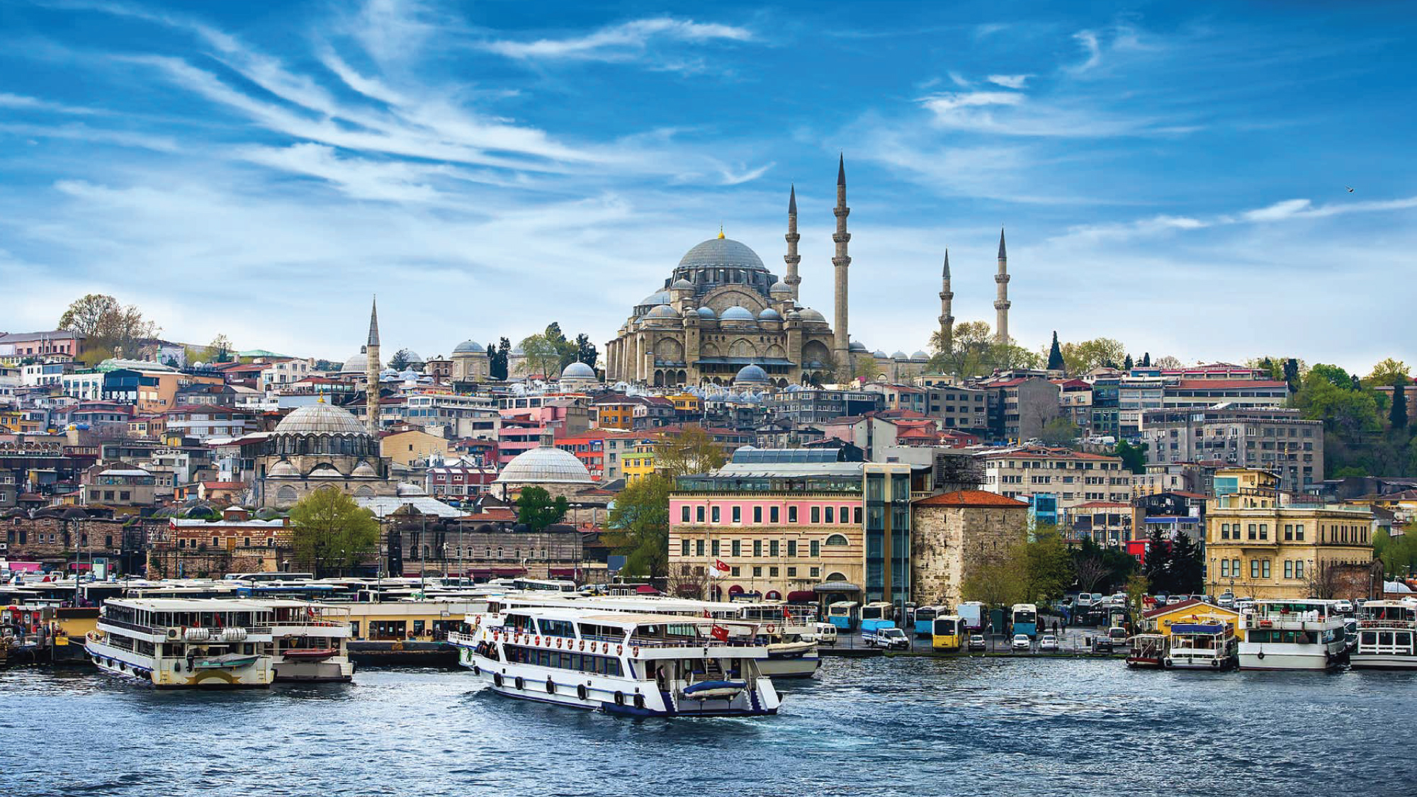 The Bosphorus strait with boats and historic landmarks.