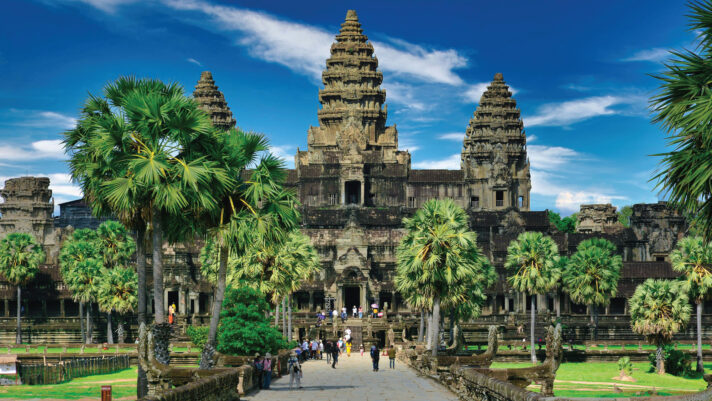 Ancient temple ruins surrounded by jungle.