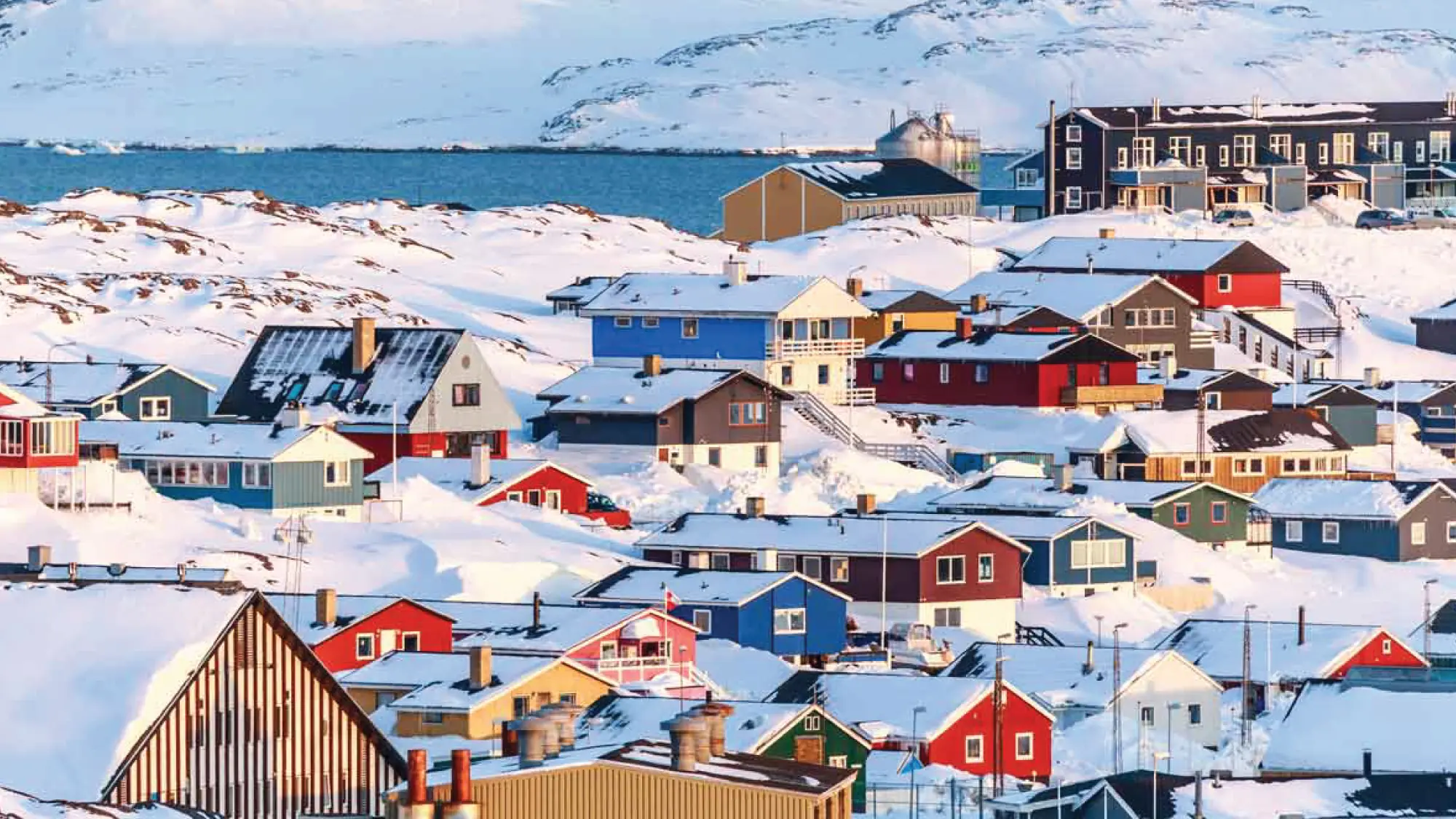 Charming view of Nuuk, Greenland covered in snow.