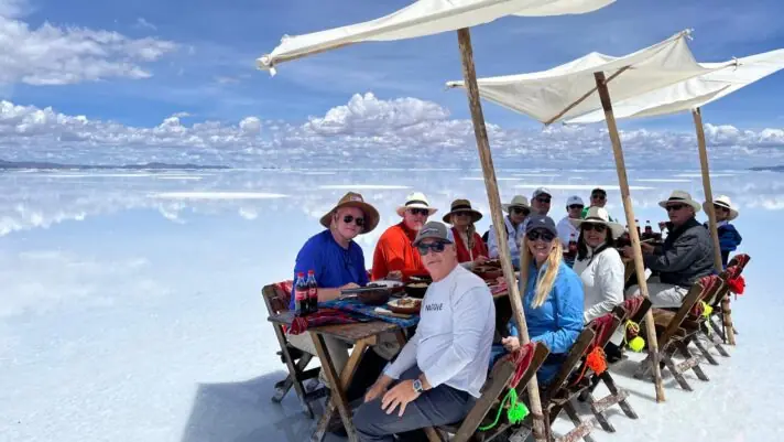 Savoring a scenic lunch amid the stunning salt flats of Uyuni, Bolivia.